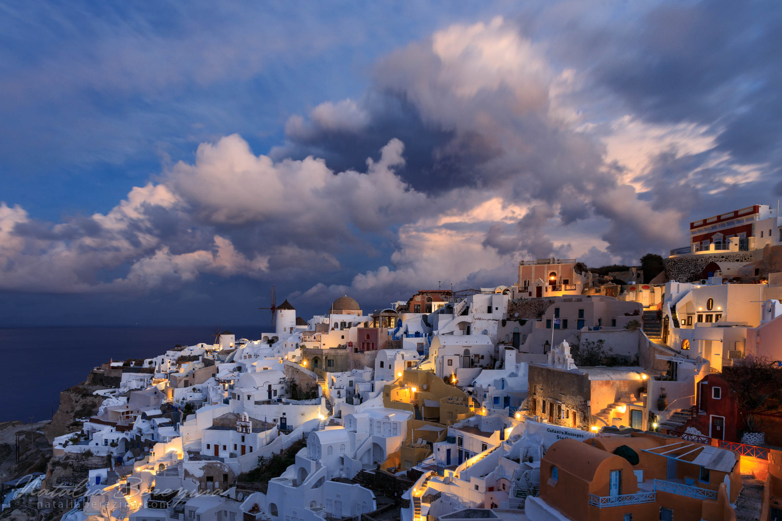Santorini (Thira), Cyclades, Greece, cityscape, cloud, blue, orange, mill SA4-NB7B6A9309 - Santorini (Thira), Greece - Natalia Berezina Photography